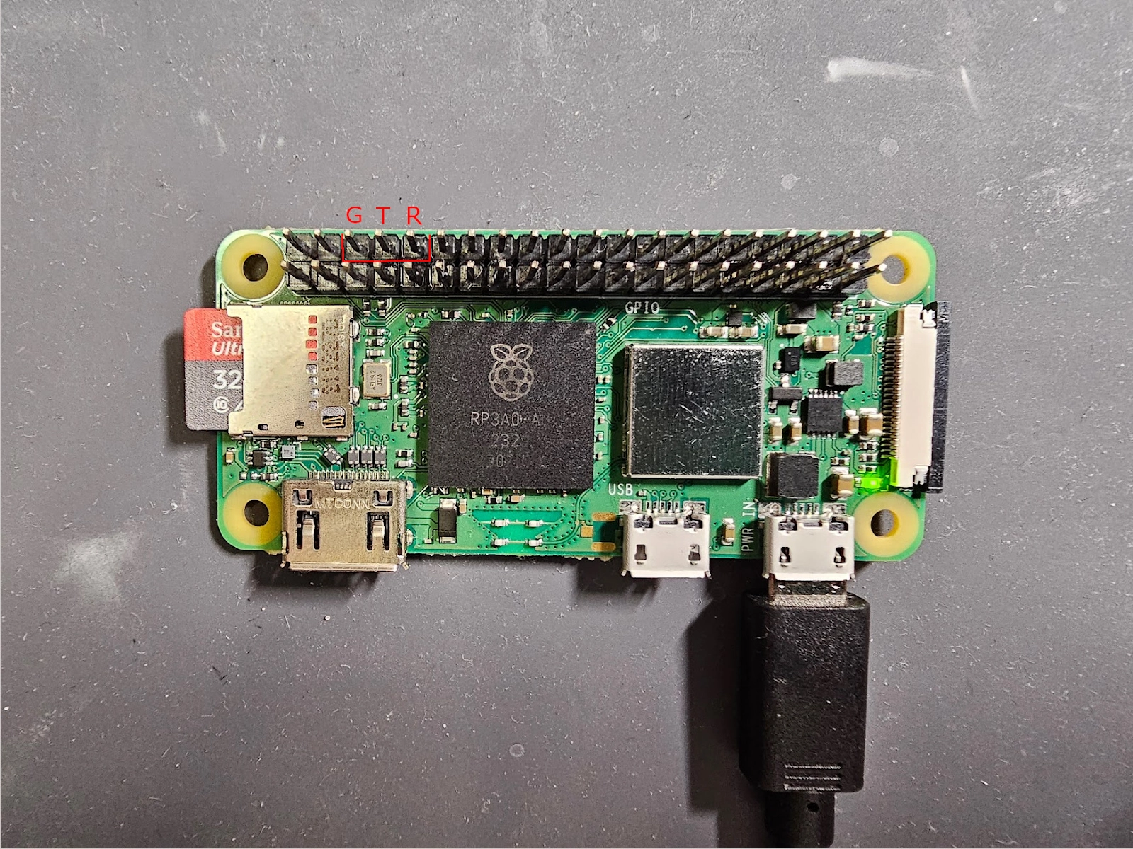 raspberry pi connected to usb with a micro sd inserted
